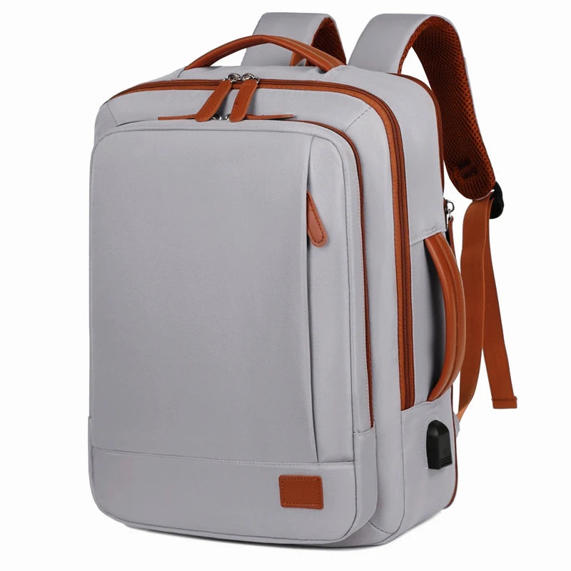 Gray backpack with brown accents on a white background