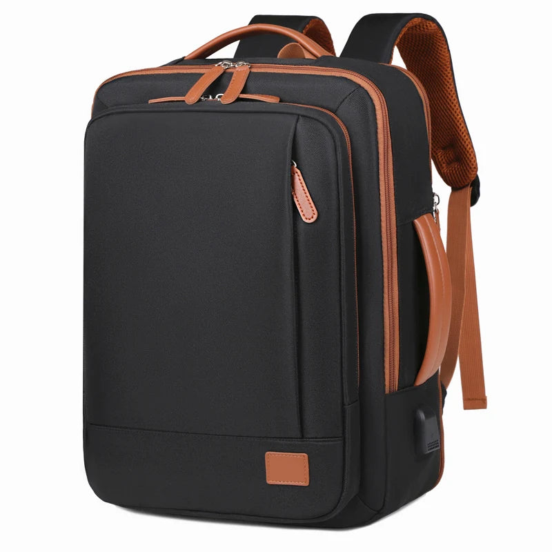 Black backpack with brown accents on a white background
