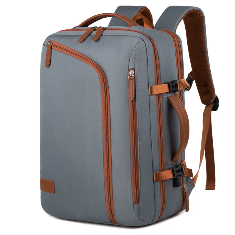 Gray backpack with brown straps and accents on a white background
