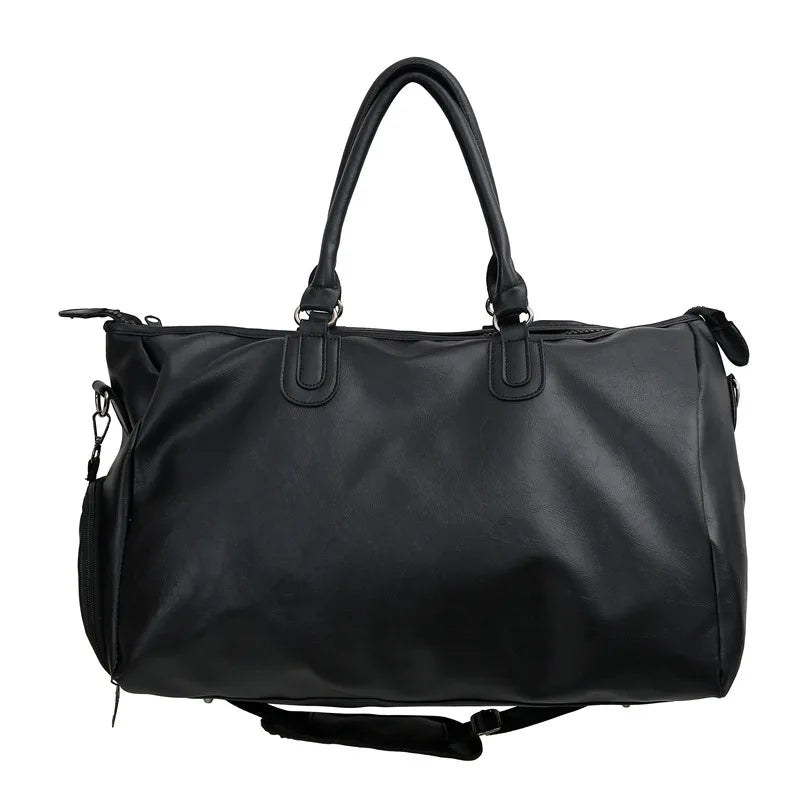 Black duffel bag with handles on a white background
