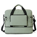 Light green travel bag with black straps on a white background