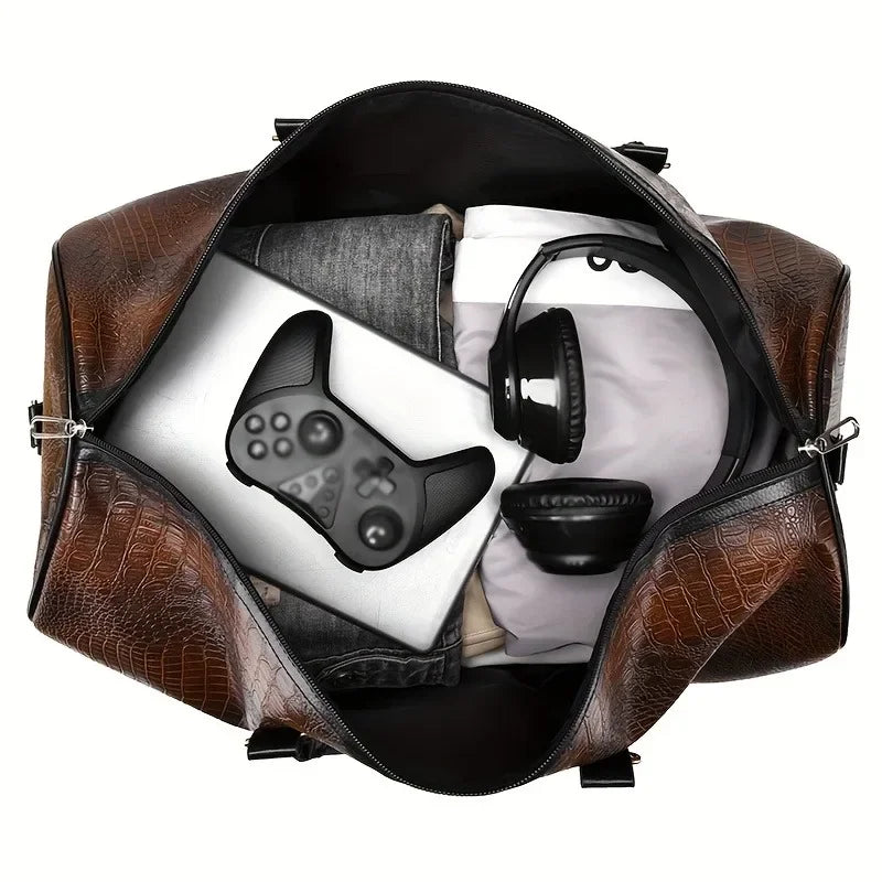 Brown leather bag with gaming controller, headphones, and other items on a white background