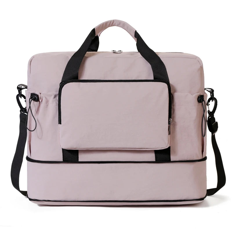 Pink travel bag with black straps on a white background