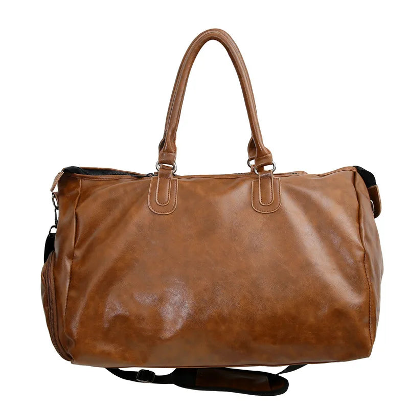 Brown leather duffel bag on a white background