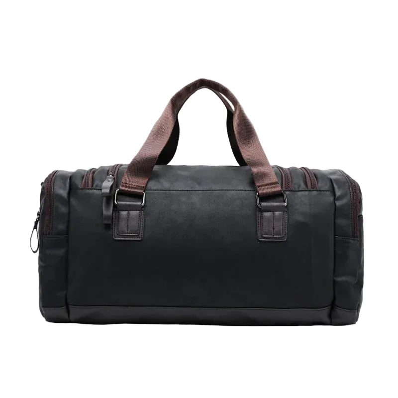 Black duffel bag with brown handles on a light gray background, featuring the Caranfier brand.