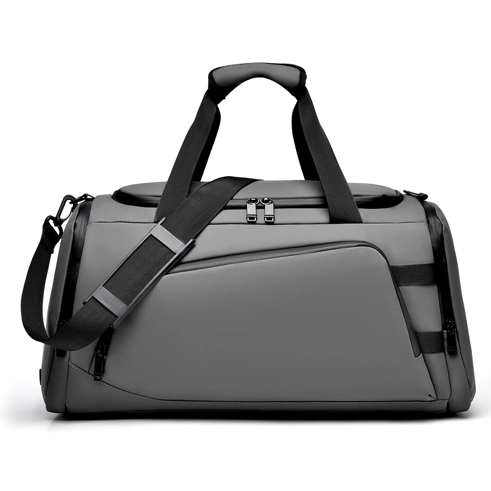 Gray duffel bag with black straps on a white background