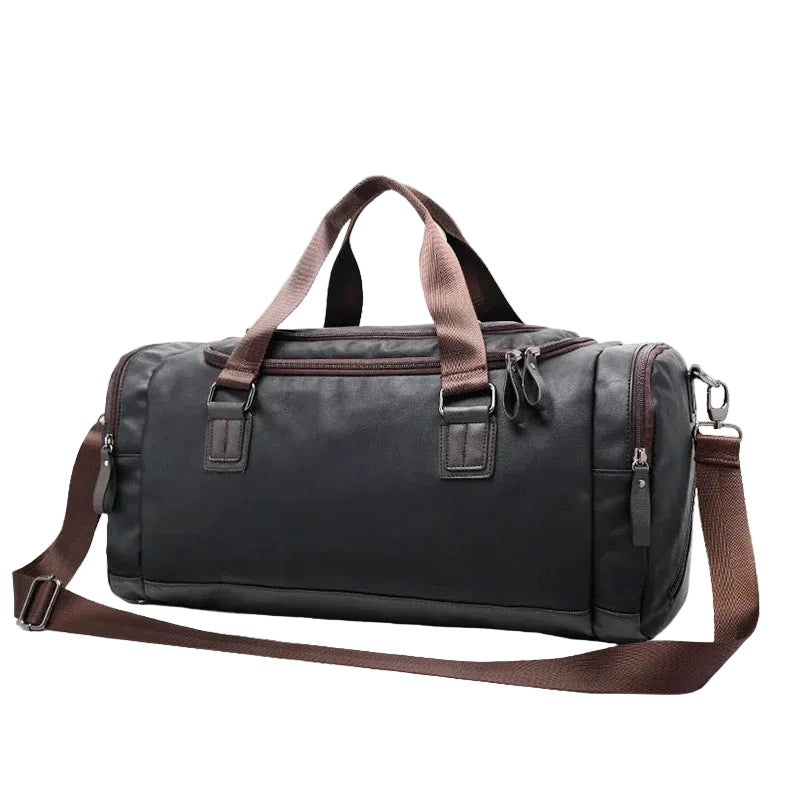 Black duffel bag with brown straps on a light gray background, featuring the Caranfier brand.
