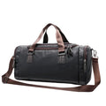 Black duffel bag with brown straps on a light gray background, featuring the Caranfier brand.