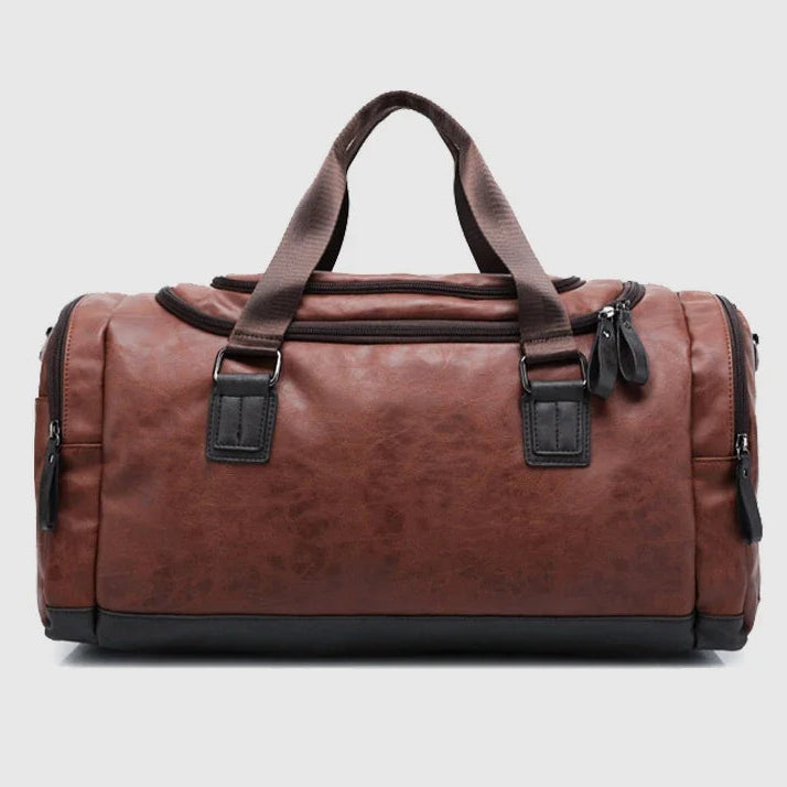 Brown duffel bag with black accents on a light gray background